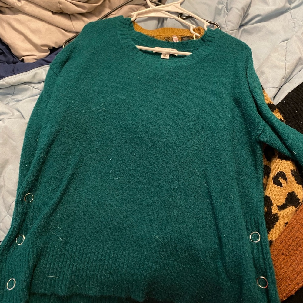 Green sweater with buttons on side